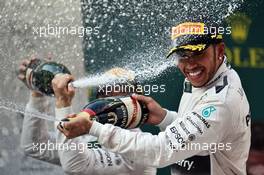 Race winner Lewis Hamilton (GBR) Mercedes AMG F1 celebrates with the champagne on the podium. 12.04.2015. Formula 1 World Championship, Rd 3, Chinese Grand Prix, Shanghai, China, Race Day.