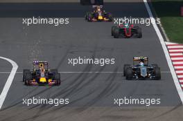 Daniil Kvyat (RUS) Red Bull Racing RB11 and Sergio Perez (MEX) Sahara Force India F1 VJM08. 12.04.2015. Formula 1 World Championship, Rd 3, Chinese Grand Prix, Shanghai, China, Race Day.