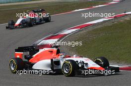 Will Stevens (GBR) Manor Marussia F1 Team leads Roberto Merhi (ESP) Manor Marussia F1 Team. 12.04.2015. Formula 1 World Championship, Rd 3, Chinese Grand Prix, Shanghai, China, Race Day.