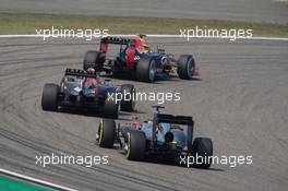 Daniil Kvyat (RUS) Red Bull Racing RB11 leads Daniel Ricciardo (AUS) Red Bull Racing RB11 and Fernando Alonso (ESP) McLaren MP4-30. 12.04.2015. Formula 1 World Championship, Rd 3, Chinese Grand Prix, Shanghai, China, Race Day.