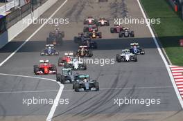 Lewis Hamilton (GBR) Mercedes AMG F1 W06 leads at the start of the race. 12.04.2015. Formula 1 World Championship, Rd 3, Chinese Grand Prix, Shanghai, China, Race Day.