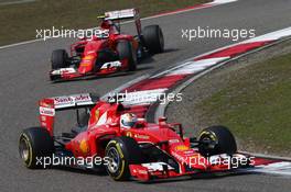 Sebastian Vettel (GER) Ferrari SF15-T leads team mate Kimi Raikkonen (FIN) Ferrari SF15-T. 12.04.2015. Formula 1 World Championship, Rd 3, Chinese Grand Prix, Shanghai, China, Race Day.
