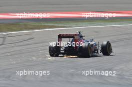 Carlos Sainz Jr (ESP) Scuderia Toro Rosso STR10 sends sparks flying. 11.04.2015. Formula 1 World Championship, Rd 3, Chinese Grand Prix, Shanghai, China, Qualifying Day.