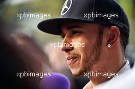 Lewis Hamilton (GBR) Mercedes AMG F1 with the media. 11.04.2015. Formula 1 World Championship, Rd 3, Chinese Grand Prix, Shanghai, China, Qualifying Day.