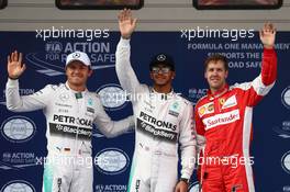 Pole for Lewis Hamilton (GBR) Mercedes AMG F1 2nd for Nico Rosberg (GER) Mercedes AMG F1 and 3rd for Sebastian Vettel (GER) Ferrari. 11.04.2015. Formula 1 World Championship, Rd 3, Chinese Grand Prix, Shanghai, China, Qualifying Day.