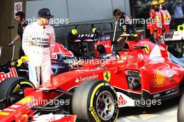 Lewis Hamilton (GBR) Mercedes AMG F1 looking at the Ferrari. 11.04.2015. Formula 1 World Championship, Rd 3, Chinese Grand Prix, Shanghai, China, Qualifying Day.