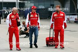 (L to R): Mark Arnall (GBR) Personal Trainer with Kimi Raikkonen (FIN) Ferrari and Gino Rosato (CDN) Ferrari. 09.04.2015. Formula 1 World Championship, Rd 3, Chinese Grand Prix, Shanghai, China, Preparation Day.