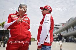 (L to R): Maurizio Arrivabene (ITA) Ferrari Team Principal with Kimi Raikkonen (FIN) Ferrari. 09.04.2015. Formula 1 World Championship, Rd 3, Chinese Grand Prix, Shanghai, China, Preparation Day.