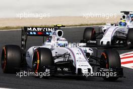 Susie Wolff (GBR) Williams FW37 Development Driver leads team mate Felipe Massa (BRA) Williams FW37. 08.05.2015. Formula 1 World Championship, Rd 5, Spanish Grand Prix, Barcelona, Spain, Practice Day.