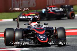 Jenson Button (GBR) McLaren MP4-30 leads team mate Fernando Alonso (ESP) McLaren MP4-30. 08.05.2015. Formula 1 World Championship, Rd 5, Spanish Grand Prix, Barcelona, Spain, Practice Day.