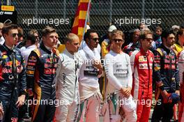 The drivers on the grid observe the national anthem. 10.05.2015. Formula 1 World Championship, Rd 5, Spanish Grand Prix, Barcelona, Spain, Race Day.