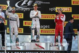 Lewis Hamilton (GBR), Mercedes AMG F1 Team, Nico Rosberg (GER), Mercedes AMG F1 Team and Sebastian Vettel (GER), Scuderia Ferrari  10.05.2015. Formula 1 World Championship, Rd 5, Spanish Grand Prix, Barcelona, Spain, Race Day.