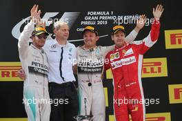 The podium (L to R): Lewis Hamilton (GBR) Mercedes AMG F1, second; Tony Ross (GBR) Mercedes AMG F1 Race Engineer; Nico Rosberg (GER) Mercedes AMG F1, race winner; Sebastian Vettel (GER) Ferrari, third. 10.05.2015. Formula 1 World Championship, Rd 5, Spanish Grand Prix, Barcelona, Spain, Race Day.