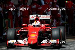 Sebastian Vettel (GER), Scuderia Ferrari during pitstop 10.05.2015. Formula 1 World Championship, Rd 5, Spanish Grand Prix, Barcelona, Spain, Race Day.