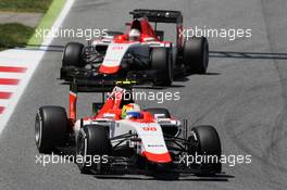 Roberto Merhi (ESP) Manor Marussia F1 Team leads Will Stevens (GBR) Manor Marussia F1 Team. 10.05.2015. Formula 1 World Championship, Rd 5, Spanish Grand Prix, Barcelona, Spain, Race Day.