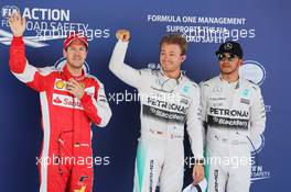 Qualifying top three in parc ferme (L to R): Sebastian Vettel (GER) Ferrari, third; Nico Rosberg (GER) Mercedes AMG F1, pole position; Lewis Hamilton (GBR) Mercedes AMG F1, second. 09.05.2015. Formula 1 World Championship, Rd 5, Spanish Grand Prix, Barcelona, Spain, Qualifying Day.