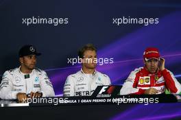 The post race FIA Press Conference (L to R): Lewis Hamilton (GBR) Mercedes AMG F1, second; Nico Rosberg (GER) Mercedes AMG F1, pole position; Sebastian Vettel (GER) Ferrari, third. 09.05.2015. Formula 1 World Championship, Rd 5, Spanish Grand Prix, Barcelona, Spain, Qualifying Day.