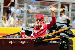 Sebastian Vettel (GER) Ferrari on the drivers parade. 10.05.2015. Formula 1 World Championship, Rd 5, Spanish Grand Prix, Barcelona, Spain, Race Day.