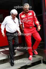 (L to R): Bernie Ecclestone (GBR) with Maurizio Arrivabene (ITA) Ferrari Team Principal. 10.05.2015. Formula 1 World Championship, Rd 5, Spanish Grand Prix, Barcelona, Spain, Race Day.