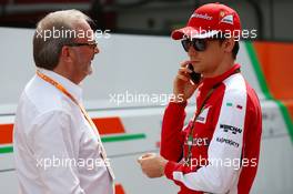 Esteban Gutierrez (MEX) Ferrari Test and Reserve Driver with Didier Coton (BEL) Driver Manager. 10.05.2015. Formula 1 World Championship, Rd 5, Spanish Grand Prix, Barcelona, Spain, Race Day.