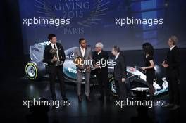Lewis Hamilton and Toto Wolff with FIA president Jean Todt and Bernie Ecclestone. 04.12.2015. FIA Prize Giving, Paris, France.