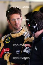 Romain Grosjean (FRA) Lotus F1 Team with Julien Simon-Chautemps (FRA) Lotus F1 Team Race Engineer. 03.07.2015. Formula 1 World Championship, Rd 9, British Grand Prix, Silverstone, England, Practice Day.