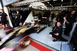Romain Grosjean (FRA) Lotus F1 E23 leaves the pits. 03.07.2015. Formula 1 World Championship, Rd 9, British Grand Prix, Silverstone, England, Practice Day.