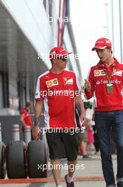 (L to R): Kimi Raikkonen (FIN) Ferrari with Esteban Gutierrez (MEX) Ferrari Test and Reserve Driver. 03.07.2015. Formula 1 World Championship, Rd 9, British Grand Prix, Silverstone, England, Practice Day.