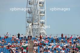 Fans in the grandstand. 03.07.2015. Formula 1 World Championship, Rd 9, British Grand Prix, Silverstone, England, Practice Day.