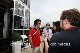 Roberto Merhi (ESP) Manor Marussia F1 Team with the media. 03.07.2015. Formula 1 World Championship, Rd 9, British Grand Prix, Silverstone, England, Practice Day.