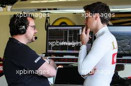 (L to R): Julien Simon-Chautemps (FRA) Lotus F1 Team Race Engineer with Jolyon Palmer (GBR) Lotus F1 Team Test and Reserve Driver. 03.07.2015. Formula 1 World Championship, Rd 9, British Grand Prix, Silverstone, England, Practice Day.