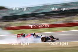 Carlos Sainz Jr (ESP) Scuderia Toro Rosso STR10 locks up under braking. 03.07.2015. Formula 1 World Championship, Rd 9, British Grand Prix, Silverstone, England, Practice Day.