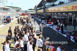 The circuit observes a minute's silence in memory of the 38 victims of the Tunisia attack. 03.07.2015. Formula 1 World Championship, Rd 9, British Grand Prix, Silverstone, England, Practice Day.