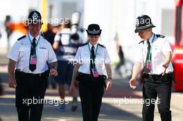 Police in the paddock. 03.07.2015. Formula 1 World Championship, Rd 9, British Grand Prix, Silverstone, England, Practice Day.