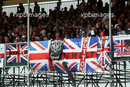 Fans and flags. 05.07.2015. Formula 1 World Championship, Rd 9, British Grand Prix, Silverstone, England, Race Day.