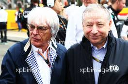 (L to R): Bernie Ecclestone (GBR) with Jean Todt (FRA) FIA President on the grid. 05.07.2015. Formula 1 World Championship, Rd 9, British Grand Prix, Silverstone, England, Race Day.