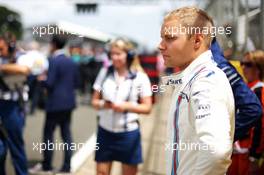 Valtteri Bottas (FIN) Williams on the grid. 05.07.2015. Formula 1 World Championship, Rd 9, British Grand Prix, Silverstone, England, Race Day.