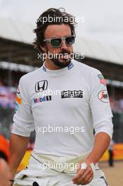 Fernando Alonso (ESP) McLaren on the grid. 05.07.2015. Formula 1 World Championship, Rd 9, British Grand Prix, Silverstone, England, Race Day.