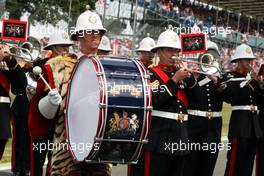 Pre race band on the grid. 05.07.2015. Formula 1 World Championship, Rd 9, British Grand Prix, Silverstone, England, Race Day.
