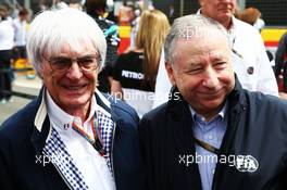 (L to R): Bernie Ecclestone (GBR) with Jean Todt (FRA) FIA President on the grid. 05.07.2015. Formula 1 World Championship, Rd 9, British Grand Prix, Silverstone, England, Race Day.