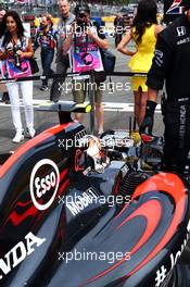 Jenson Button (GBR) McLaren MP4-30 on the grid. 05.07.2015. Formula 1 World Championship, Rd 9, British Grand Prix, Silverstone, England, Race Day.