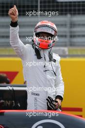 Jenson Button (GBR) McLaren on the grid. 05.07.2015. Formula 1 World Championship, Rd 9, British Grand Prix, Silverstone, England, Race Day.