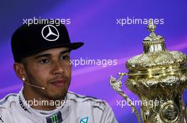 Race winner Lewis Hamilton (GBR) Mercedes AMG F1 in the FIA Press Conference with his race trophy. 05.07.2015. Formula 1 World Championship, Rd 9, British Grand Prix, Silverstone, England, Race Day.