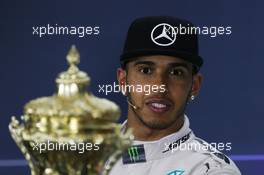 Race winner Lewis Hamilton (GBR) Mercedes AMG F1 in the FIA Press Conference with his race trophy. 05.07.2015. Formula 1 World Championship, Rd 9, British Grand Prix, Silverstone, England, Race Day.