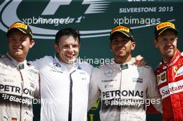 The podium (L to R): Nico Rosberg (GER) Mercedes AMG F1, second; Peter Bonnington (GBR) Mercedes AMG F1 Race Engineer; Lewis Hamilton (GBR) Mercedes AMG F1, race winner; Sebastian Vettel (GER) Ferrari, third. 05.07.2015. Formula 1 World Championship, Rd 9, British Grand Prix, Silverstone, England, Race Day.
