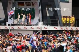 The podium (L to R): Nico Rosberg (GER) Mercedes AMG F1, second; Lewis Hamilton (GBR) Mercedes AMG F1, race winner; Sebastian Vettel (GER) Ferrari, third. 05.07.2015. Formula 1 World Championship, Rd 9, British Grand Prix, Silverstone, England, Race Day.