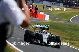 Race winner Lewis Hamilton (GBR) Mercedes AMG F1 W06 celebrates at the end of the race. 05.07.2015. Formula 1 World Championship, Rd 9, British Grand Prix, Silverstone, England, Race Day.