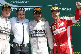 Nico Rosberg (GER), Mercedes AMG F1 Team, Lewis Hamilton (GBR), Mercedes AMG F1 Team and Sebastian Vettel (GER), Scuderia Ferrari  05.07.2015. Formula 1 World Championship, Rd 9, British Grand Prix, Silverstone, England, Race Day.