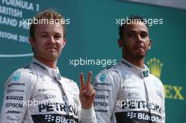 2nd place Nico Rosberg (GER) Mercedes AMG F1 W06 with 1st pplace Lewis Hamilton (GBR) Mercedes AMG F1. 05.07.2015. Formula 1 World Championship, Rd 9, British Grand Prix, Silverstone, England, Race Day.