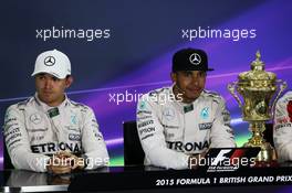 The post race FIA Press Conference (L to R): Nico Rosberg (GER) Mercedes AMG F1, second; Lewis Hamilton (GBR) Mercedes AMG F1, race winner. 05.07.2015. Formula 1 World Championship, Rd 9, British Grand Prix, Silverstone, England, Race Day.